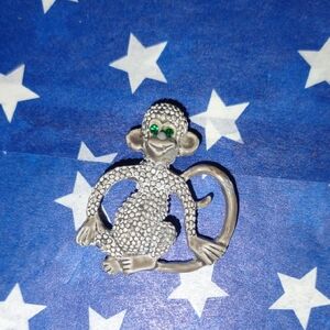 Silver Monkey Brooch with Green Eyes Signed Gerry's Brooch